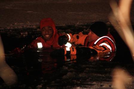 Crews learning and practicing ice rescue strategies and tactics.