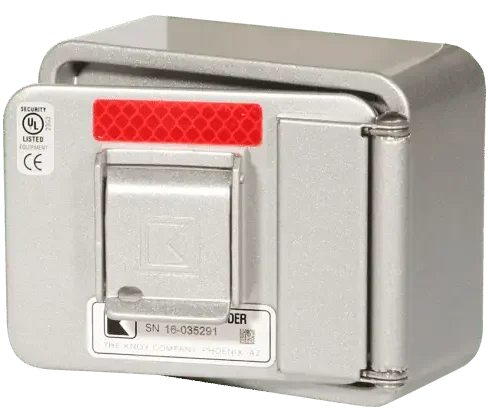 A heavy-duty, red and silver industrial knox-box mounted on a wall.